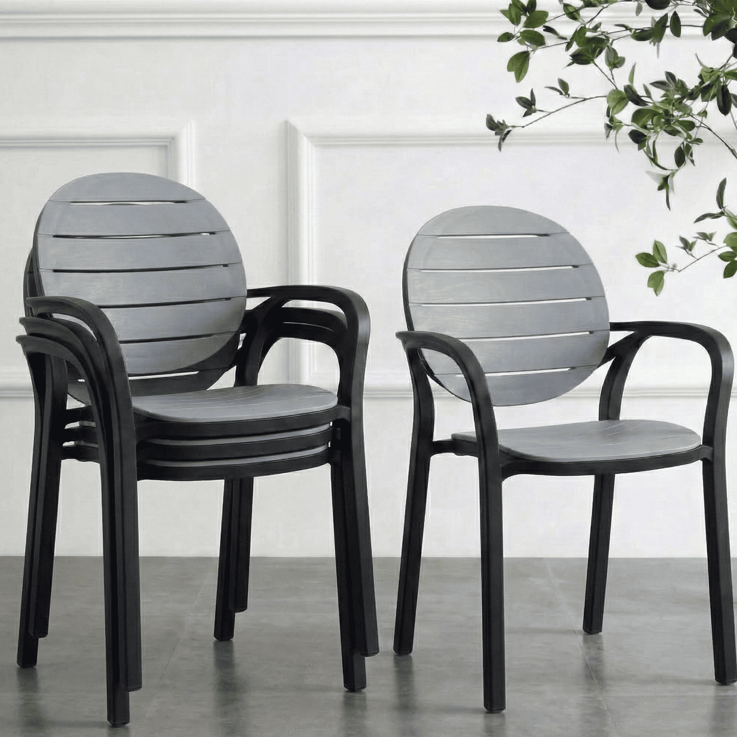 Pack of 4 gray chairs with black frames on a reflective surface.