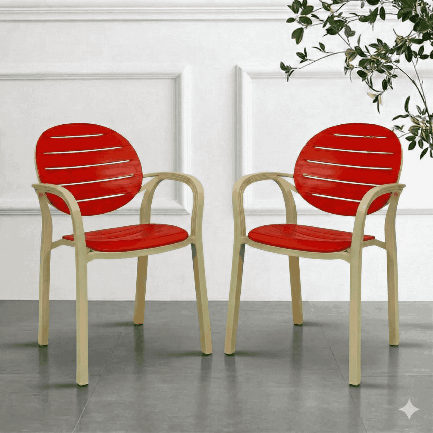 Two red chairs with ash white frames on a gray floor against a white wall